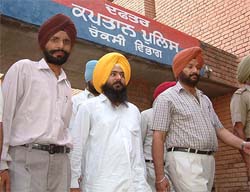 Mr Manjinder Singh Kang being taken to a court