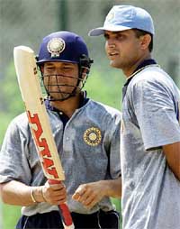 India's captain Saurav Ganguly and Sachin Tendulkar talk at a practice session in Colombo