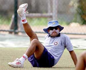 India's Virendar Sehwag does stretching exercises