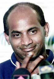 Sri Lanka's captain Sanath Jayasuriya smiles during a news conference