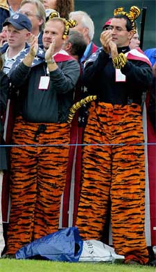 Fans of Tiger Woods wear tiger trousers