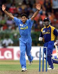 Ajit Agarkar of India celebrates after claiming the wicket of Sri Lanka's captain