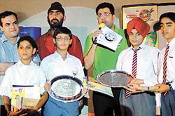 The winners of Discovery Kids quiz contest with their prizes at St John�s School, Sector-26, in Chandigarh on Monday. 