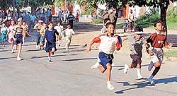 Children participate in a mini-marathon