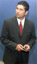 Indian cricketer Sachin Tendulkar attends a press conference in Mumbai