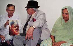 Parents of Lieut-Commander Rajesh Saini, who died in mid-air collision involving two naval planes at Goa recently, being consoled by UT Administrator, Lieut-Gen J.F.R. Jacob