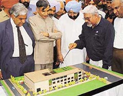 The Chief Minister of Punjab, Capt Amarinder Singh, along with the MP, Mr Pawan Kumar Bansal, takes a look at the model of "Law Bhawan" of the Bar Council 