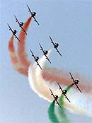 Military aircraft fly over the skies