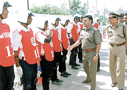 Joint Commissioner of Police B. K. Gupta meeting participants in the safe driving training programme