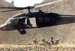 A US Black Hawk helicopter lands an assault team in south-eastern Afghanistan