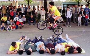 A South Korean student on a bike