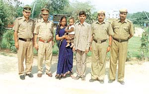 The two accused along with police officials.