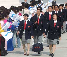 South Koreans wave unification flags