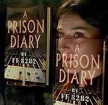 A member of the public glances at a display of Britain's Lord Archer's Prison Diaries