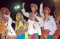 Artistes perform a traditional Garba dance