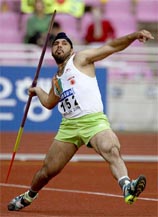 India's Harminder Singh competes in the men's javelin final at the 14th Asian Games