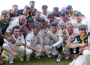 The Australian cricket team poses after winning their second Test match
