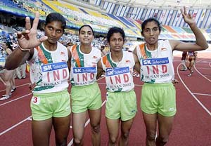 India's women's 4x400m relay team celebrate their gold medal performance at the 14th Asian Games in Busan on Sunday