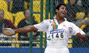 Anil Kumar competes in the men's discus final