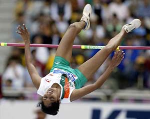 India's Bobby Aloysius clears the bar