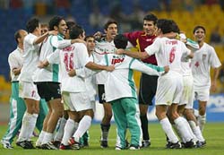 Iran's football players celebrate after winning the final match at the 14th Asian Games in Busan on Sunday