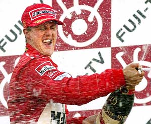 German Michael Schumacher of Ferrari sprays champagne in celebration of his Formula One Japanese Grand Prix victory 