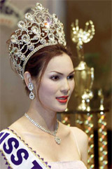 Thanyaporn Anyasiri, 24, a transsexual economist, dressed in a traditional Thai costume 