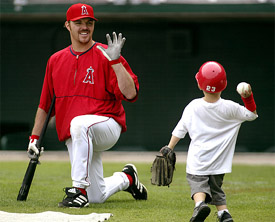 Anaheim Angels' Scott Spiezio plays catch with son Tyler