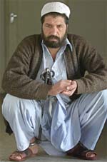 Afghanistan�s notorious military commander Abdullah Shah sits in Kabul�s prison on Wednesday