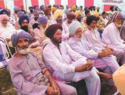 Farmers attend a state-level programme