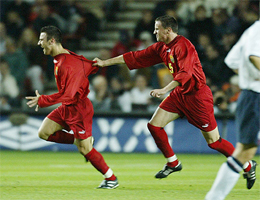 Macedonia's Vanco Trajanov celebrates his goal
