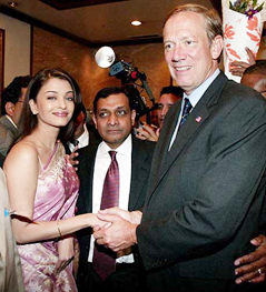 Aishwarya Rai, guest of honour, shakes hands with New York Governor George Pataki 