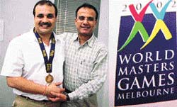 Arun Dhand receives greetings from his old co-player