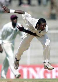Pedro Collins of the West Indies bowls during the second day's play of the second Test match between India and the West Indies