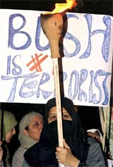 A torch-bearing Pakistani woman