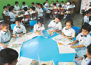 Nursery students  in their classroom.