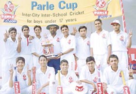 The Salwan Boys School team, who won the third Parle Cup Cricket Tournament, with the trophy