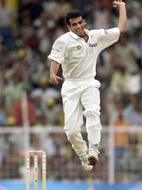 Zaheer Khan celebrates taking the wicket of Ridley Jacobs