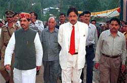 Civil Aviation Minister Shahnawaz Hussain wearing a Himachali cap arrives to attend the famous Dasehra festival