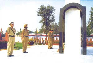 Mr R. C. Aggarwal, Special Director-General, Border Security Force, stands in attention after laying floral wreaths at the BSF Martyrs� Memorial in New Delhi