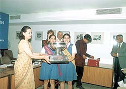 Chairperson of the Rajiv Gandhi Foundation Sonia Gandhi distributing the first prize of the Mahbub ul Haq Memorial Debate Competition to the winner
