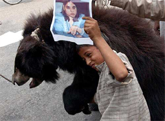 A child during a demonstration held to protest against Maneka Gandhi's remarks