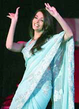 Film actress Aishwarya Rai dances to the song �Dola re dola� from "Devdas" at the Kochi Konther Asar Benefit Concert