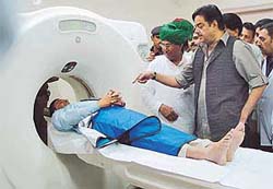 The Union Health Minister, Mr Shatrughan Sinha, inspects a CT-scan machine after inaugurating the new building of General Hospital, Sector 6, in Panchkula