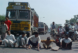 Visually challenged students block traffic