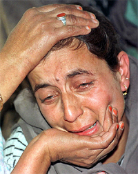 Mother of slain former militant Muzaffer Khalil Bhat