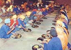 Children of killed militants partake langar at an orphanage being run by Mata Gujri Trust at Basti Jodhewal, Ludhiana