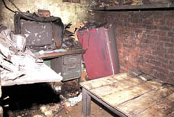 The burnt remains of a jhuggi