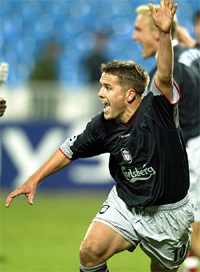Michael Owen of Liverpool celebrates after scoring the second goal