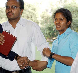 Drug-tainted athlete Sunita Rani  accompanied by her brother appears before the one-man enquiry committee